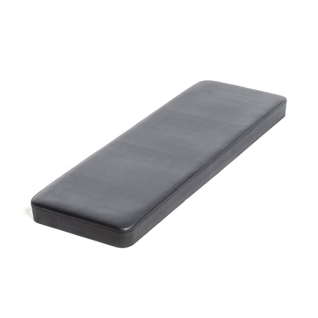 A sleek black leather Buzzsaw Back Pad by Bells of Steel USA rests on a white background. This rectangular cushion with smooth edges is a compatible replacement for the Buzzsaw Bench, offering enhanced seating comfort and modern support.