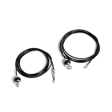 Two coiled black replacement cables with metal connectors are shown on a plain white background. From Bells of Steel USA, these Selectorized Lat Pulldown Low Row Machine Cables, one slightly longer than the other, ensure smooth performance and durability.