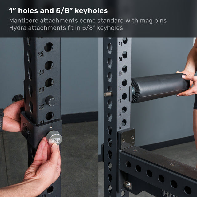 Close-up of the Bells of Steel Manticore Squat Stand - Prebuilt (3" x 3", 1" Holes) gym rack, featuring measurement marks on the uprights, mag pins, and a padded roller attachment being installed. Ideal for any home gym or squat stand setup, with text at the top detailing hole sizes and compatibility with Manticore and Hydra attachments.