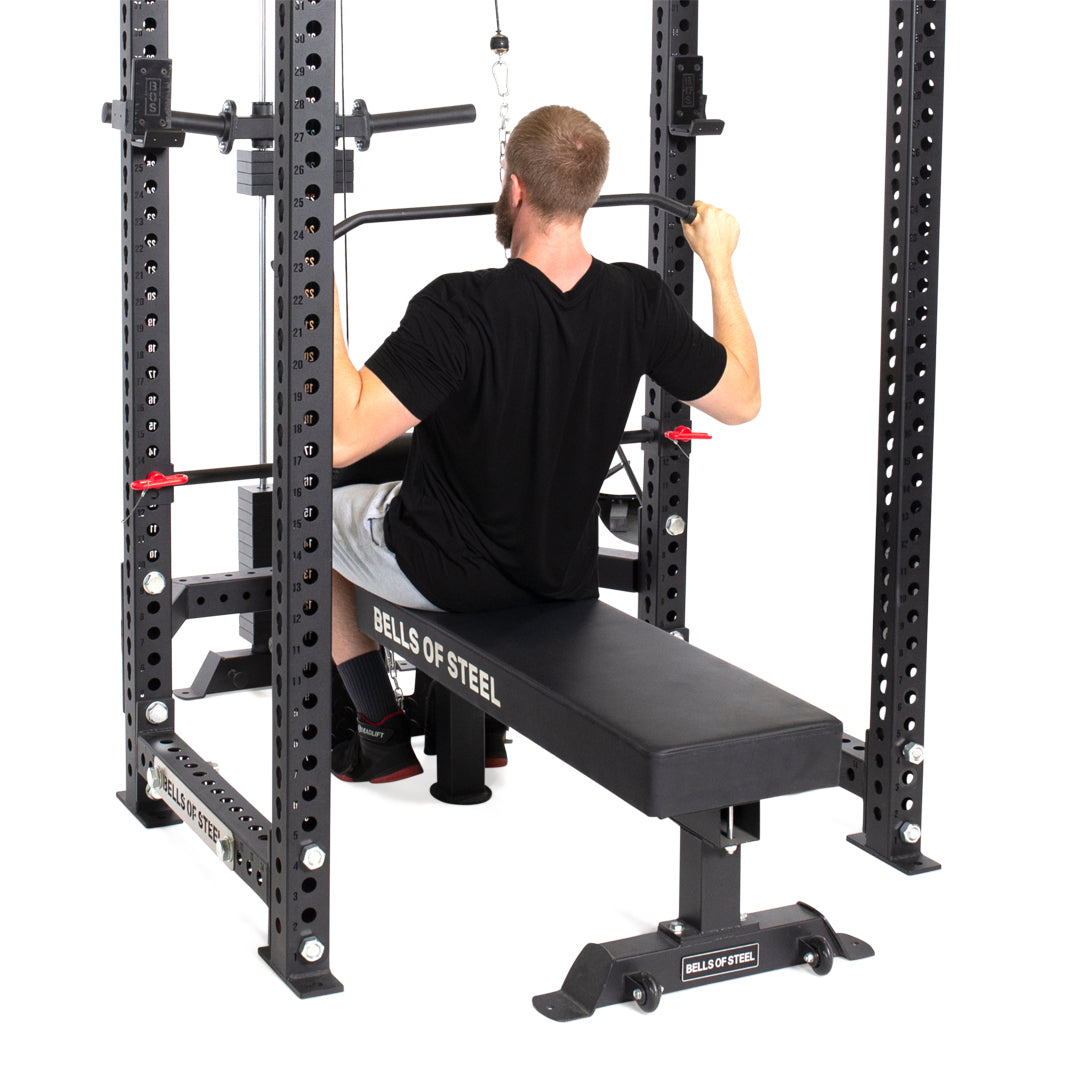 Male athlete doing lat pulldown exercise using Weight Stack Lat Pulldown & Low Row Rack Attachment - Manticore