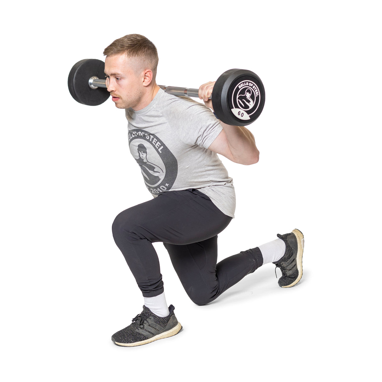Male model doing lunge with fixed straight barbell