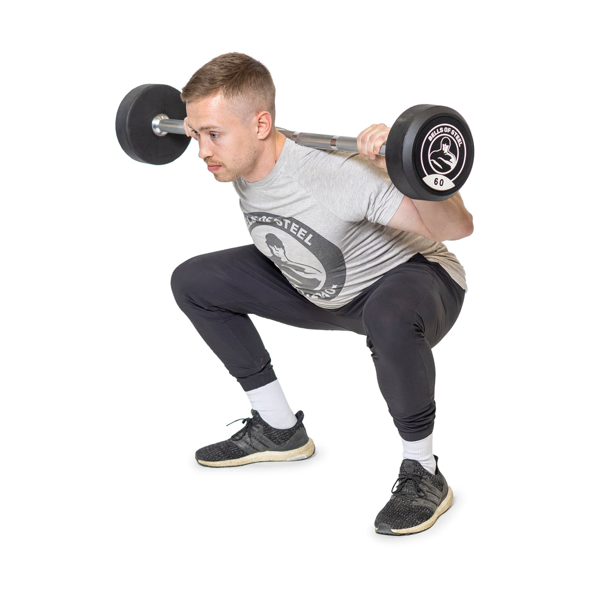 Male model doing squat with fixed straight barbell