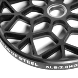 Close-up of a black steel weight plate with a lattice pattern and virgin rubber coating, labeled "5 LB / 2.3 KG," highlighting the precision associated with Bells of Steel's Technique Plates - 5 lbs (Pair).