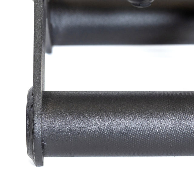 Close-up of the Fat Bar - T-Bar Row Cable Attachment by Bells of Steel. This black cylindrical metal roller, featuring a textured surface for better grip, is set within a rectangular frame and positioned horizontally against a white background.