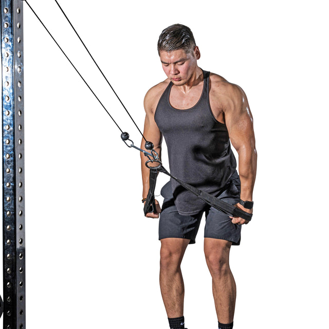 Fitness Enthusiast doing a cable pullover by using the RocIT Tricep Strap