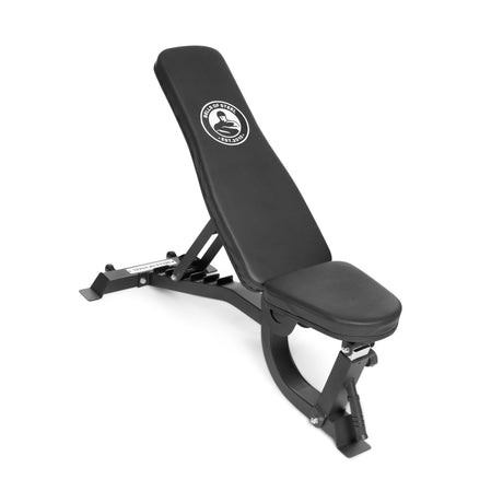 The Bells of Steel Adjustable Utility Bench features a padded seat and backrest with a fitness logo, sturdy metal frame, 575lb max capacity, and is shown in an inclined position on a white background.