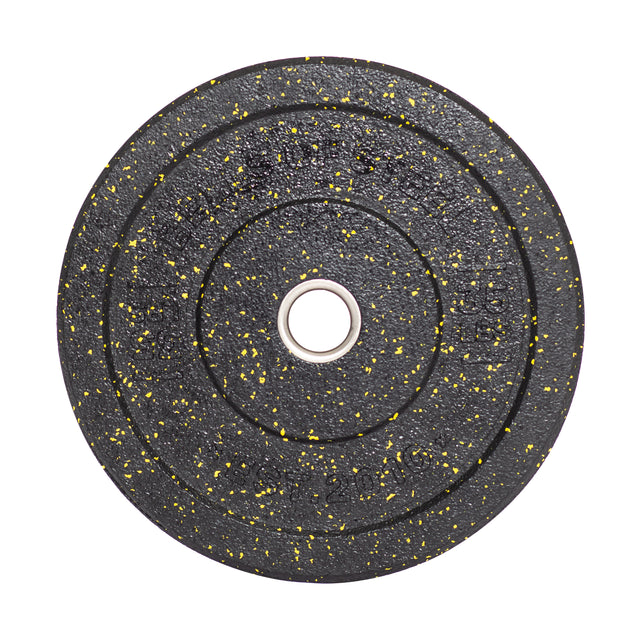 Close-up of a Bells of Steel Crumb Bumper Plate, featuring a round black design with yellow specks and a central hole, perfect for weightlifting or enhancing your lifting game.