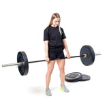 Female athlete holding Multi-Purpose Olympic Barbell – The Utility Bar - Standard