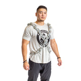 A man models the Bells of Steel Chain Weight Vest, draping weighted chains over his shoulders and across his torso against a plain white background—a bold look for serious strength training.
