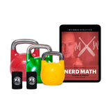 The Wildman Clean & Press Kettlebell Bundle by Bells of Steel USA includes red, green, and yellow kettlebells with two black wristbands. An iPad displays the "Nerd Math Clean & Press Program" featuring a man and crossed kettlebell design for total-body strength in your fitness journey.