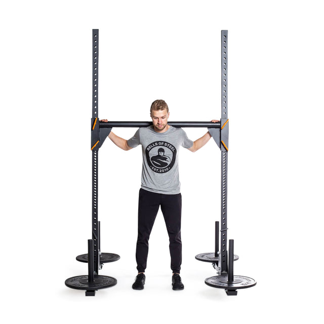 Athlete demonstrating strength by lifting Yoke