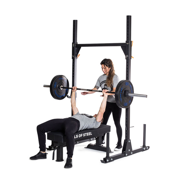 	Athletes demonstrating flat bench press using Strongman Yoke