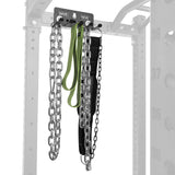 The Bells of Steel Accessory Holder (Wall or Rack Mounted) organizes lifting chains, a green resistance band, and a black weightlifting belt, keeping your gym accessories neat and accessible on its gray, numbered rack.