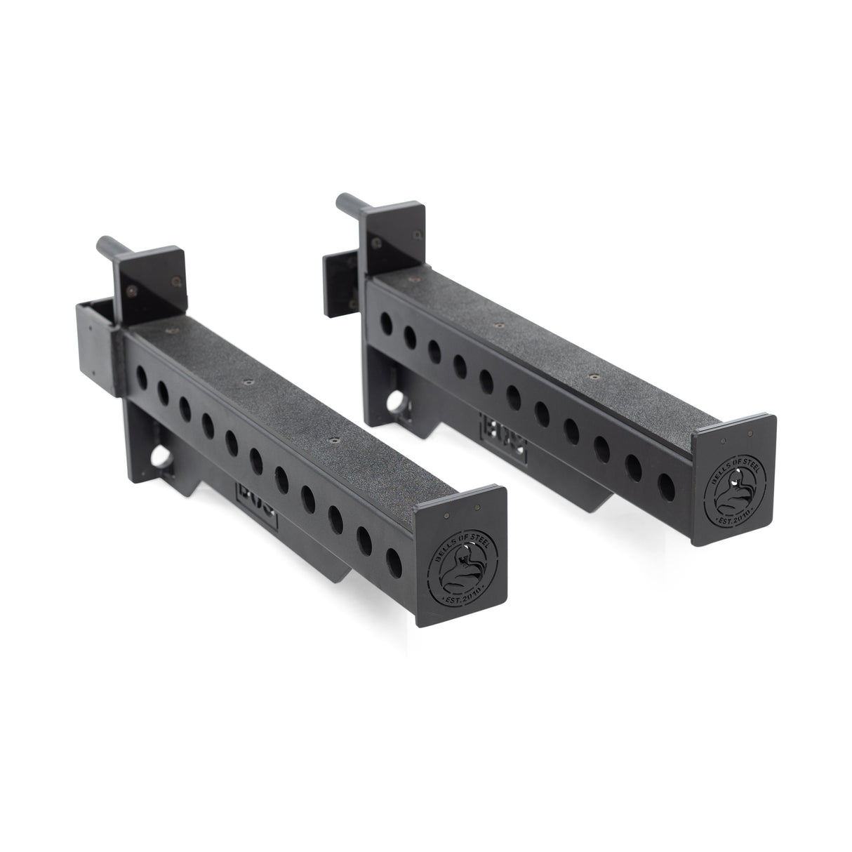 Two Bells of Steel Spotter Arms Rack Attachments, made from heavy-duty black metal with adjustable holes and a cylindrical design, are paired with two silver locking pins on a white surface.