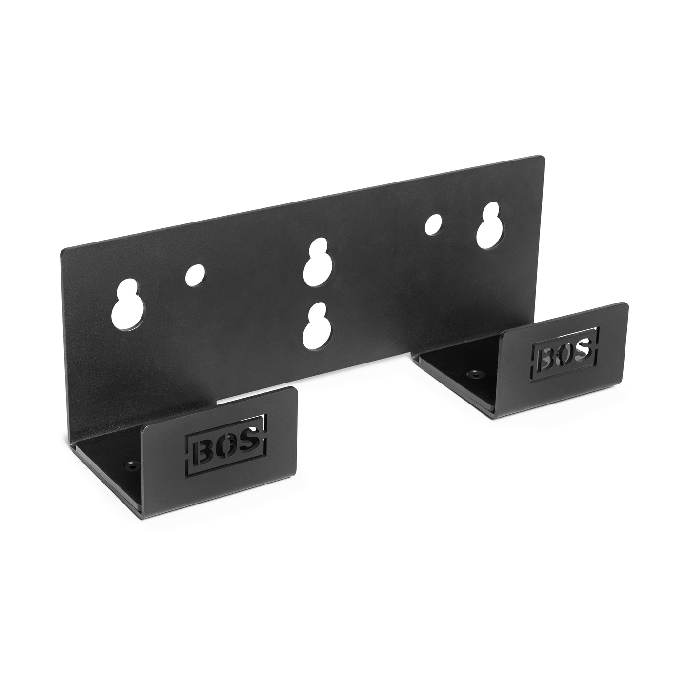The Bells of Steel Wall or Rack Mounted Bench Hanger is a black metal bracket with dual side supports and multiple keyhole slots for mounting. Designed to optimize gym floor space, it features “BOS” cutouts on the supports.