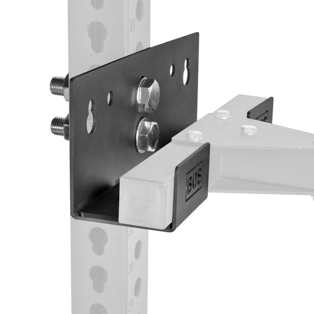 Close-up of the Bells of Steel Wall or Rack Mounted Bench Hanger attached to a vertical post with bolts. Featuring multiple holes for adjustable mounting, it supports a white "BOS" arm. Background is plain and uncluttered.