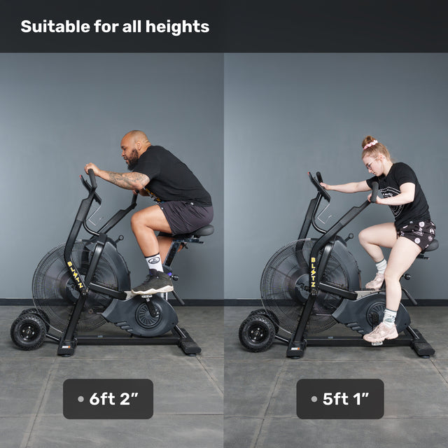 Two people of different heights use the Bells of Steel Blitz Max Air Bike, highlighting its adjustable design. Text reads: “Blitz Max Air Bike: built to fit all riders—ideal for any gym.”.