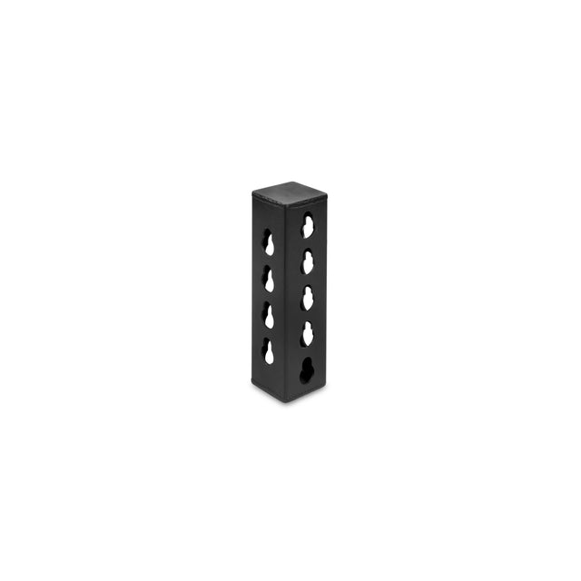 The Bells of Steel USA Rack Junctions - 3" x 3" is a black, rectangular metal block with multiple circular holes, ideal for rack setup or junctions, shown standing upright on a white background.