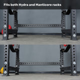 Two close-up views of Bells of Steel USA’s 43" Crossmember For Converter Bench on black power rack bases with multiple holes. Text at the top reads, “Fits both Hydra and Manticore racks.” Gray background, red and yellow weights visible.
