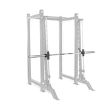 A Smith Machine Rack Attachment by Bells of Steel in a power rack with safety bars and weight plate holders. The grey outline highlights the rack, contrasting with the fully colored bodybuilding equipment for emphasis.