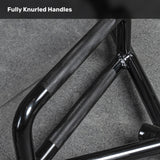 Close-up of a black metal handle with full knurled grip on a gray textured surface. Text reads, "Fully Knurled Handles"—ideal for strength training or adding to your Bells of Steel Open Trap Bar / Hex Bar setup.