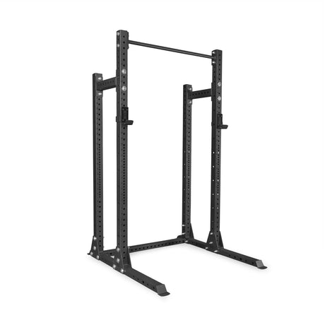 The Bells of Steel Hydra Half Rack - Prebuilt (3" x 3", ⅝" Holes) is a black metal rack with a pull-up bar, adjustable safety bars, and modular height options—perfect for any home gym—shown on a white background.