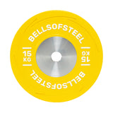 A vivid yellow Boltless KG Competition Bumper Plate from Bells of Steel, labeled "15 KG" in white, features a metallic center hole for Olympic lifts and is built to IWF specifications.