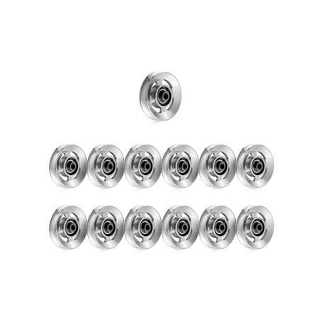 Twelve silver ball bearings are arranged in a triangle, echoing the precision of Bells of Steel Aluminum Pulley Wheels & Upgrade Kits, displayed on a white background.
