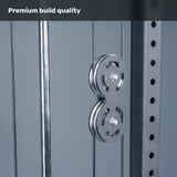 Close-up of the metallic double pulley system on the Bells of Steel Lat Pulldown Low Row Machine, attached to a frame with evenly spaced holes. Caption at top: "Premium build quality.