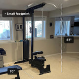 The Bells of Steel Lat Pulldown Low Row Machine, measuring 70" wide by 87" tall, is shown in a carpeted room. The equipment's small footprint is highlighted for efficient cable back training.