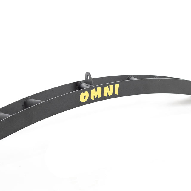 The Omni Bar by Bells of Steel is a curved metal structure featuring "Omni Bar" in yellow on its side against a white background, with a small bracket on top reminiscent of power rack designs.