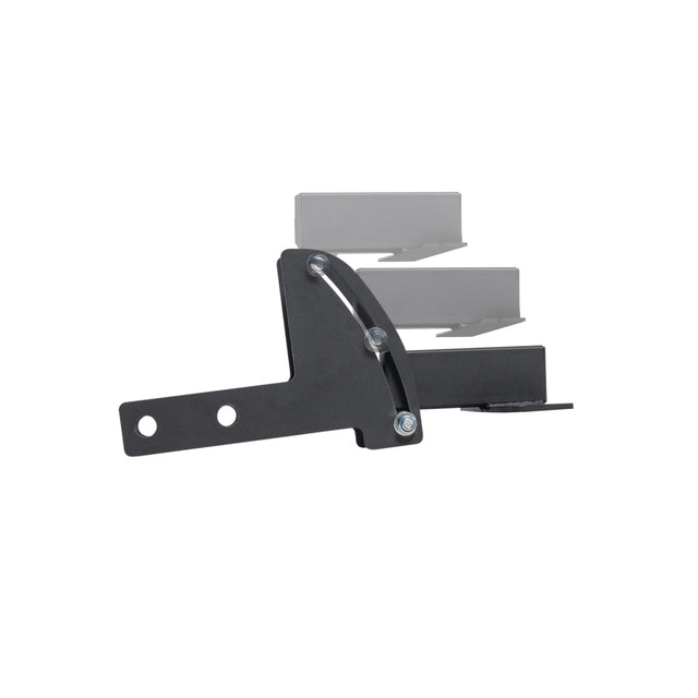 Black metal bracket with three visible bolts and two circular holes on one end, shown with ghosted images of a rectangular component in multiple positions—part of the Bells of Steel 3x3 Cable Tower to Rack Connection Kit for adjustable centre-mount cable towers.