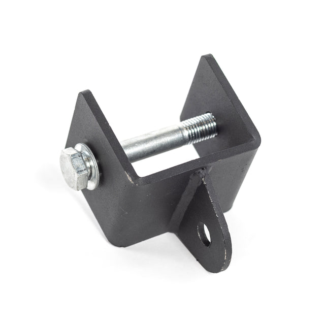 The Bells of Steel Utility Shackle Rack Attachment is a black metal, U-shaped bracket ideal for power rack setups. It features a bolt on one side and a mounting hole on the other, perfect for gym equipment. Its smooth finish ensures sleek durability.