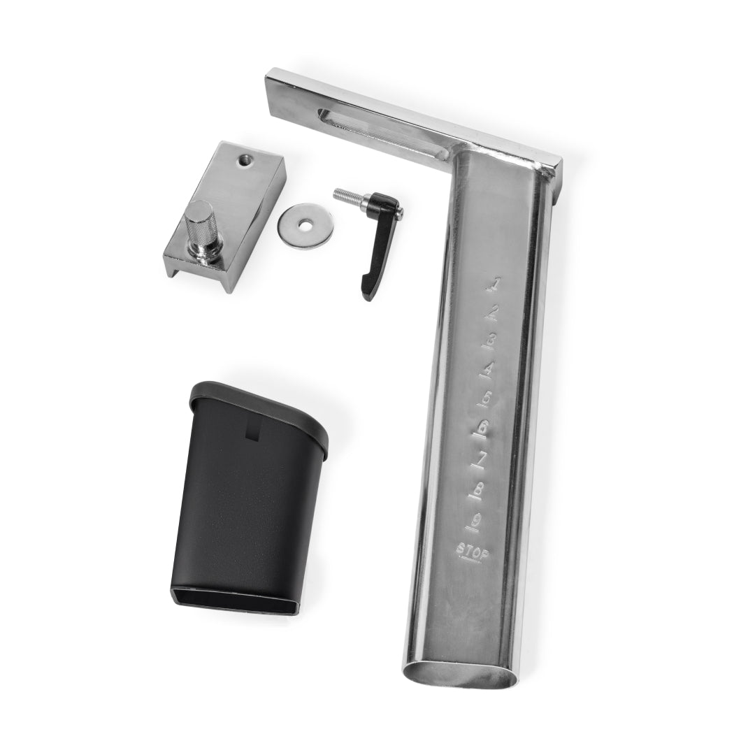 The Bells of Steel USA Blitz Air Bike Seat Adjustment Assembly includes a rectangular bracket, black plastic cover, latch, washer, and mounting plate for Version 2.0, all displayed on a white background.