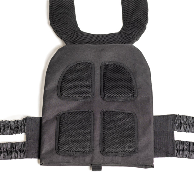 The Bells of Steel Weighted Vest is black with cushioned shoulder straps and four padded front sections. It features elastic side straps for flexibility and comfort, designed to hold training plates for durability and sturdiness during workouts.