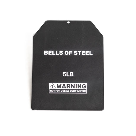 The Bells of Steel USA Weighted Vest includes a black 5LB weight plate made from durable steel, engraved with "BELLS OF STEEL 5LB" and a warning: "NOT FOR USE AS BODY ARMOR." It has a slanted top edge and small central hole for easy attachment to the vest.